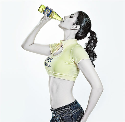  girl, world drinking soda, girl on white background, girl yellow top, girl with genes, genes, ponytail,